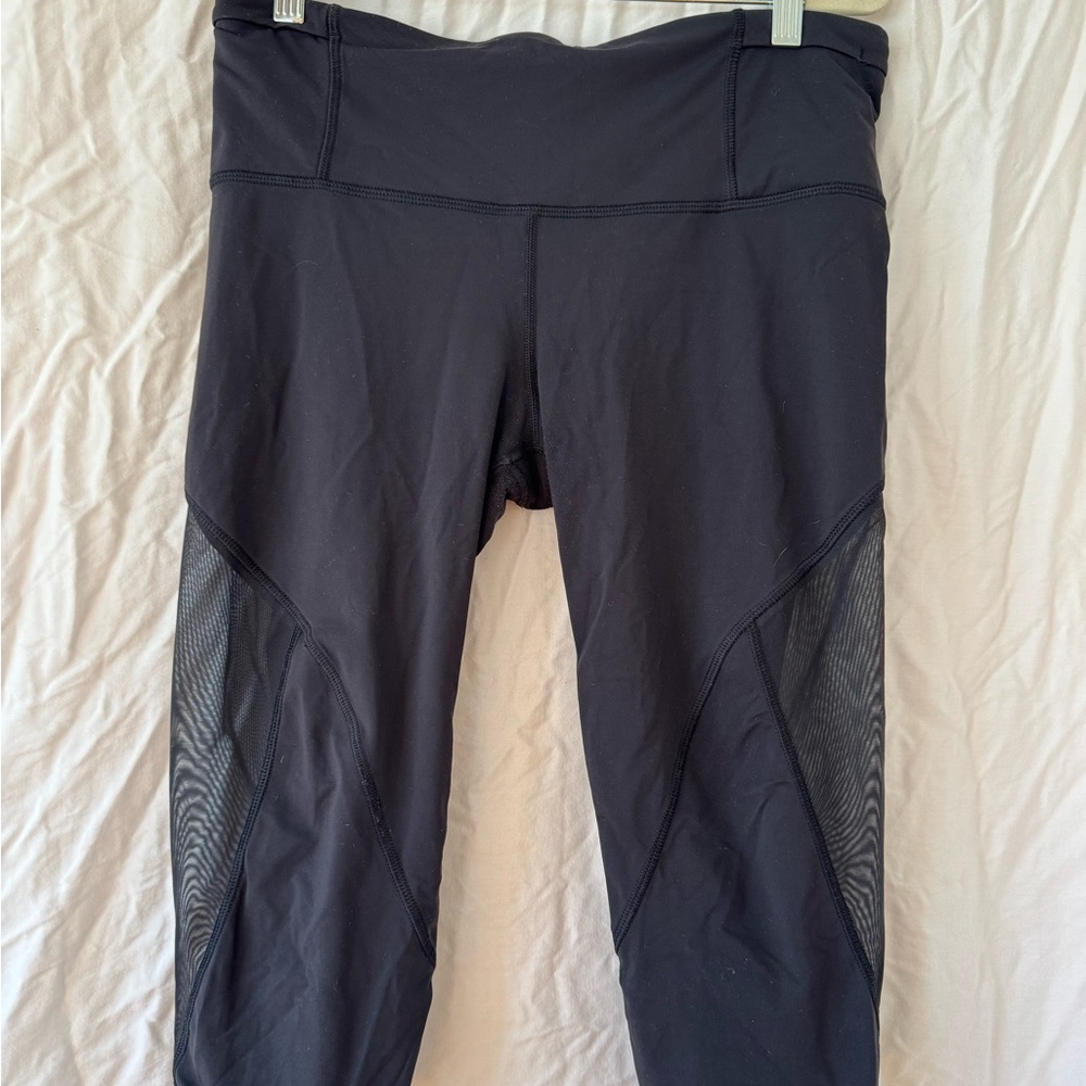 Lululemon cropped black leggings with pocket and mesh detail